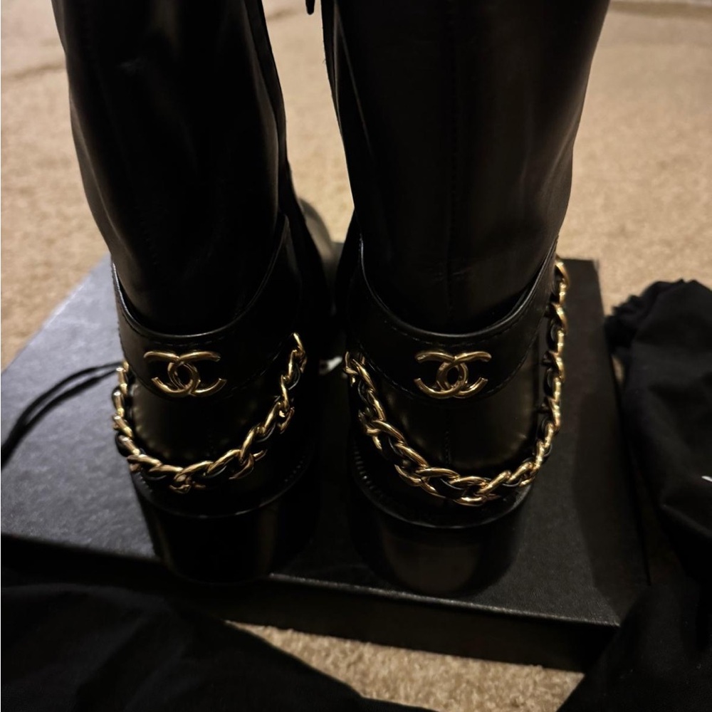 CHANEL Black Boots with Gold Chain Accent